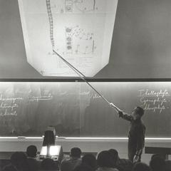 Professor using overhead projector