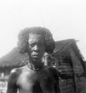Kuba-Mbegi Upper Body Scarification and Hair Styled with Redwood Paste