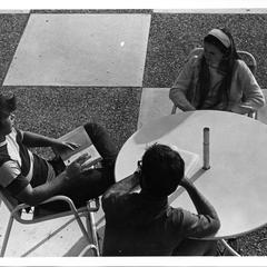 Students socializing on the patio