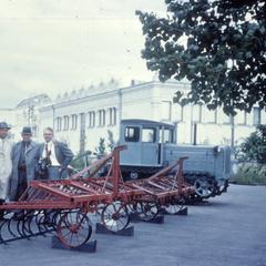 Men with agricultural equipment