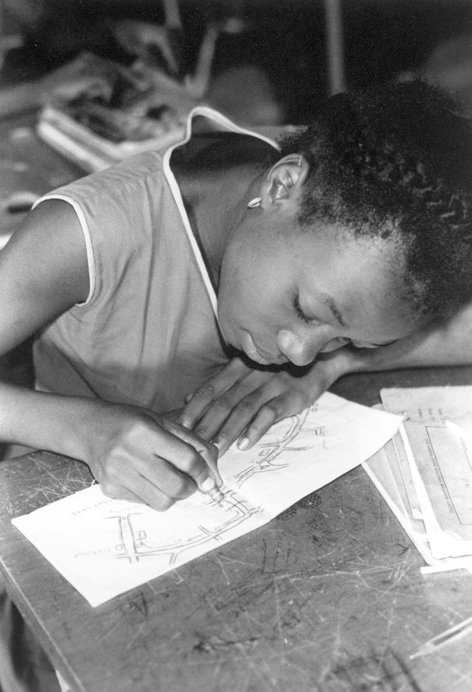 Girl Making a Map at a Primary School