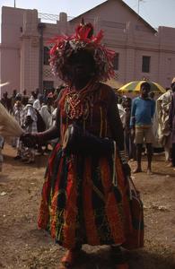 Person in traditional dress during the Iwude festival