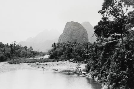 View of the karst mountains surrounding the town of Vang Vieng with the Nam Xong River in the foreground in Vientiane Province