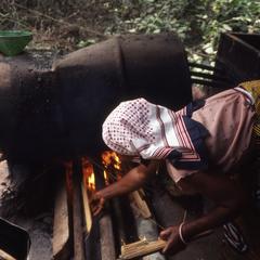 Woman at stove making ogogoro