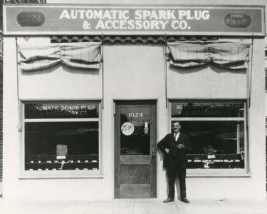 Axel Meier in front of his automobile shop