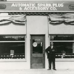 Axel Meier in front of his automobile shop