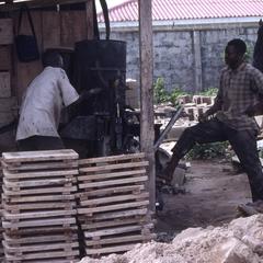 People at cement block factory
