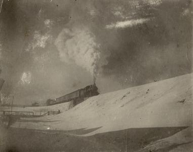 Steam freight train in winter