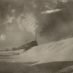 Steam freight train in winter