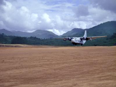 An Air America C-123 landing