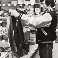 Student shopping, Janesville, 1970