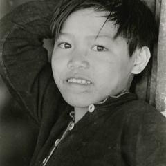 A Lanten boy in traditional dress in Houa Khong Province