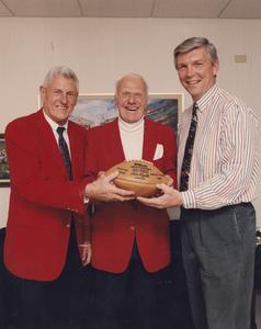 Elroy Hirsch holds 1965 Packers Football