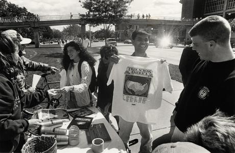 Students sell tee shirts and gear on University Avenue