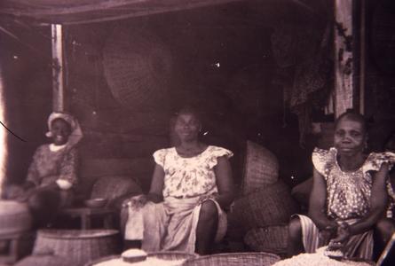 Three women and baskets