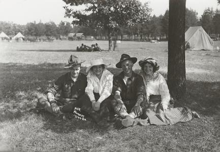 Two couples pose for a picture at Camp Douglas