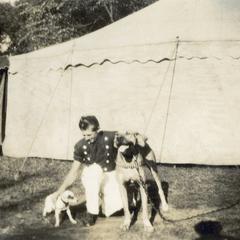 Circus performer with two dogs