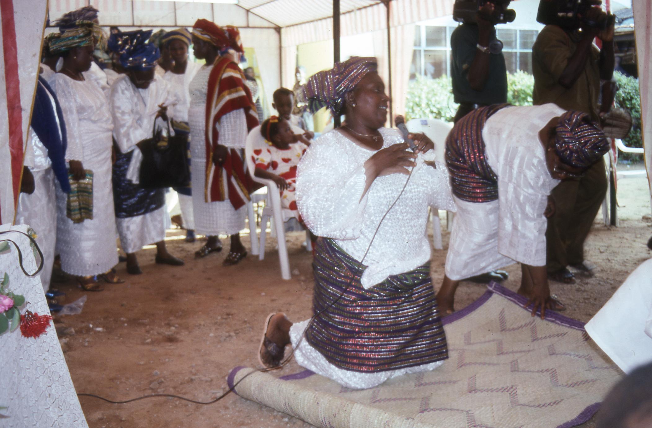 Woman leading prayers