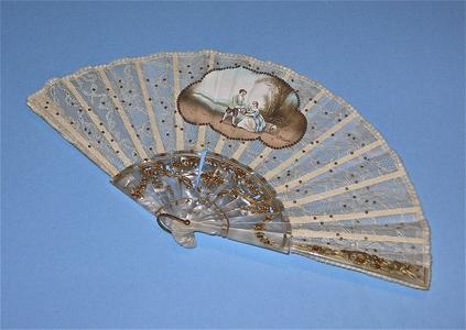 Fan sprinkled with tiny silver sequins
