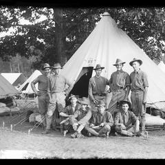 Soldiers in front of military tent camp