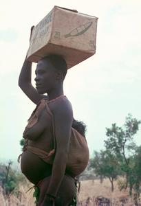 Woman with Baby on Back and Load on Head