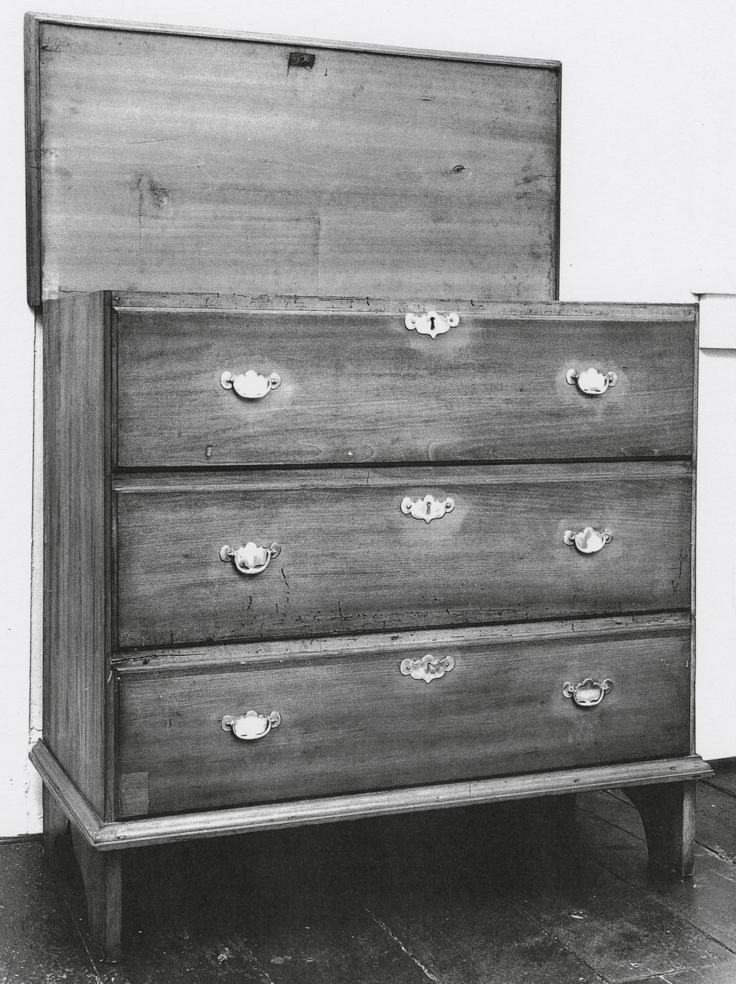 Black and white photograph of a one-drawer blanket chest.