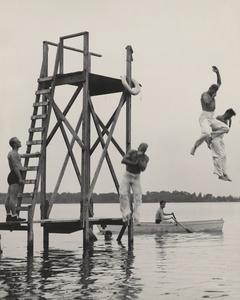 Recruits jumping into a lake