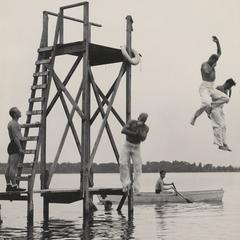 Recruits jumping into a lake