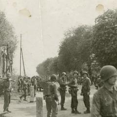 American soldiers standing around after the fighting
