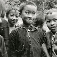 A group of Blue Hmong (Hmong Njua) children pose for a photograph in a Hmong village in the vicinity of Muang Vang Vieng in Vientiane Province