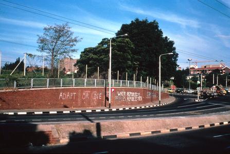 Prime Minister P.W. Botha's Slogan, "Adapt or Die," Painted on Wall Facing Jan Smuts Avenue, Johannesburg, During Anti-Republic Day Activities