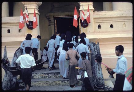 Vietnamese entering temple