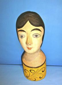 Hand painted mannequin with black hair, blue eyes and red lips