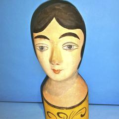Hand painted mannequin with black hair, blue eyes and red lips