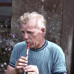 Duncan Williamson playing the tin whistle