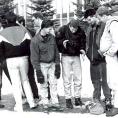 Students playing with snow