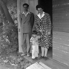 Helene Stratman-Thomas with man and child