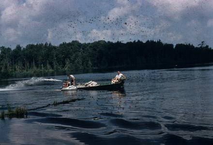 Men in boat on lake