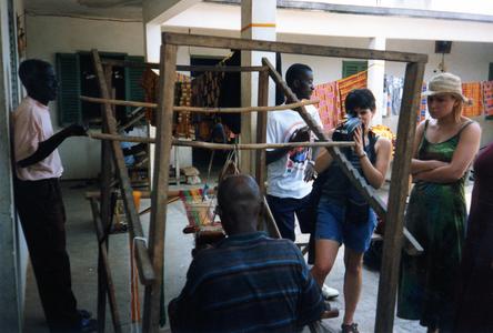 Students filming a Bonwire Kente weaver work