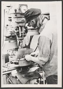 Student using a milling machine