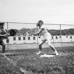 Women playing baseball