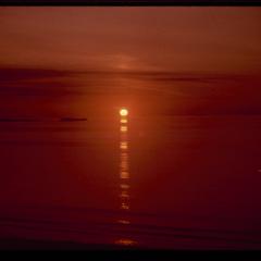 Setting sun reflected in the Atlantic Ocean, the Isle of Tiree