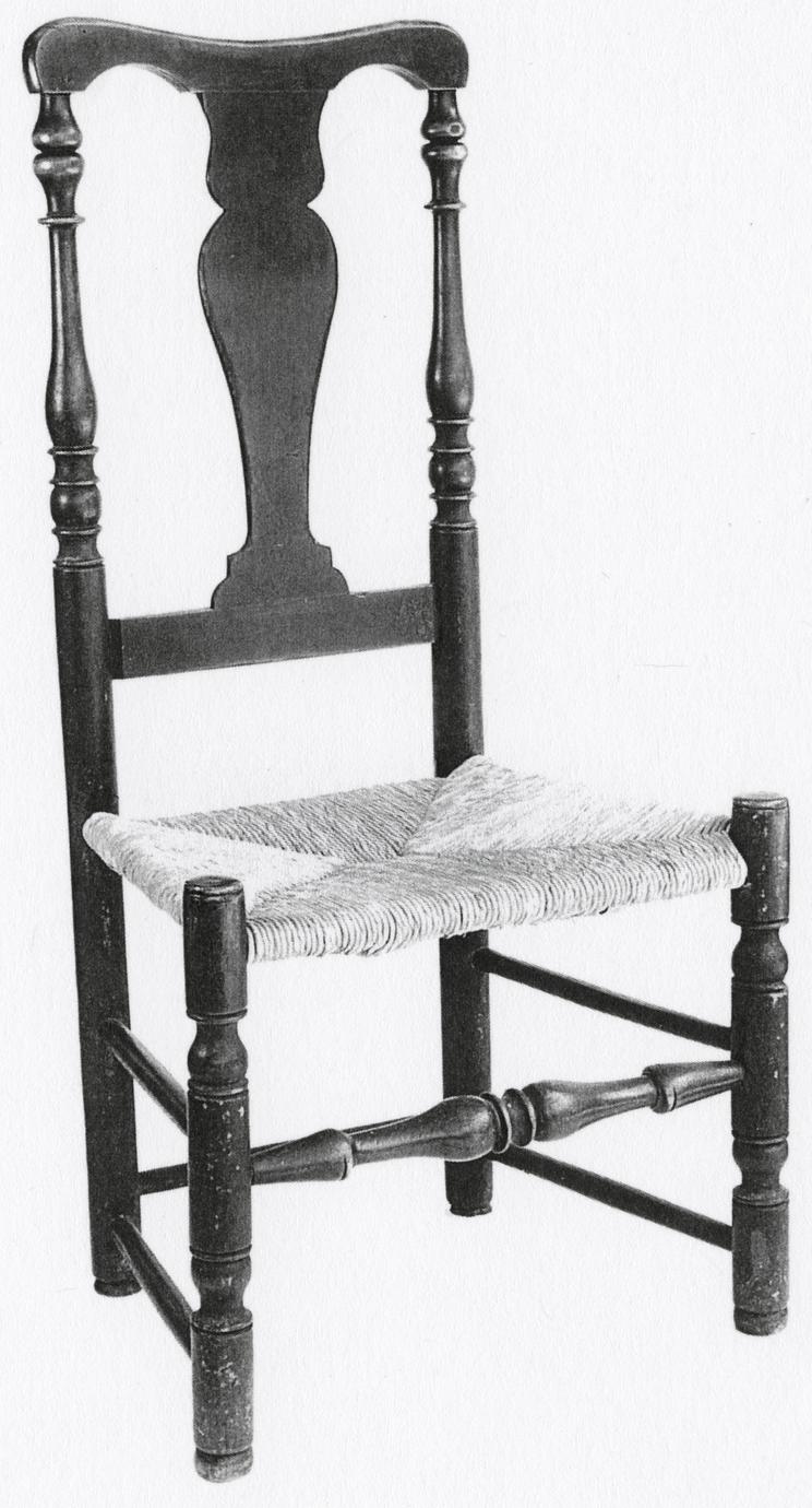 Black and white photograph of a "splat-back" side chair.