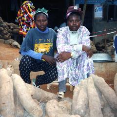 Two seated yam traders