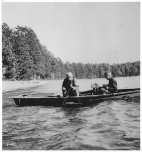 Hugo Baum and E.A. Birge on lake with "sun machine"