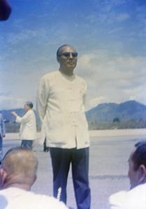 Phagna Pheng Phongsavan awaits the arrival of Prince Souphanouvong at the Luang Prabang airport April 4, 1974