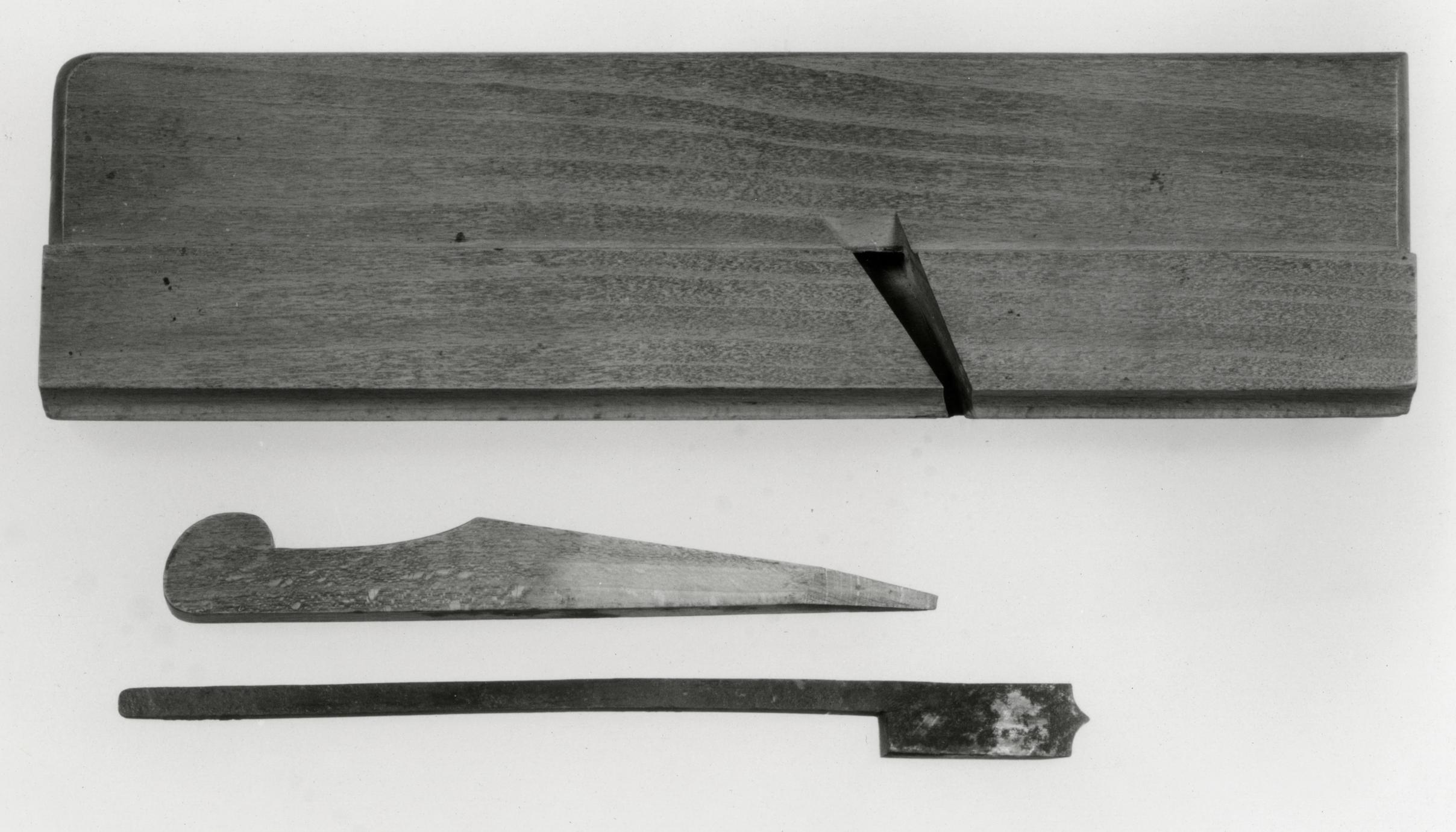 Black and white photograph of a double ovolo or quarter-round plane.