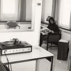Student using UW-Waukesha Library music collection