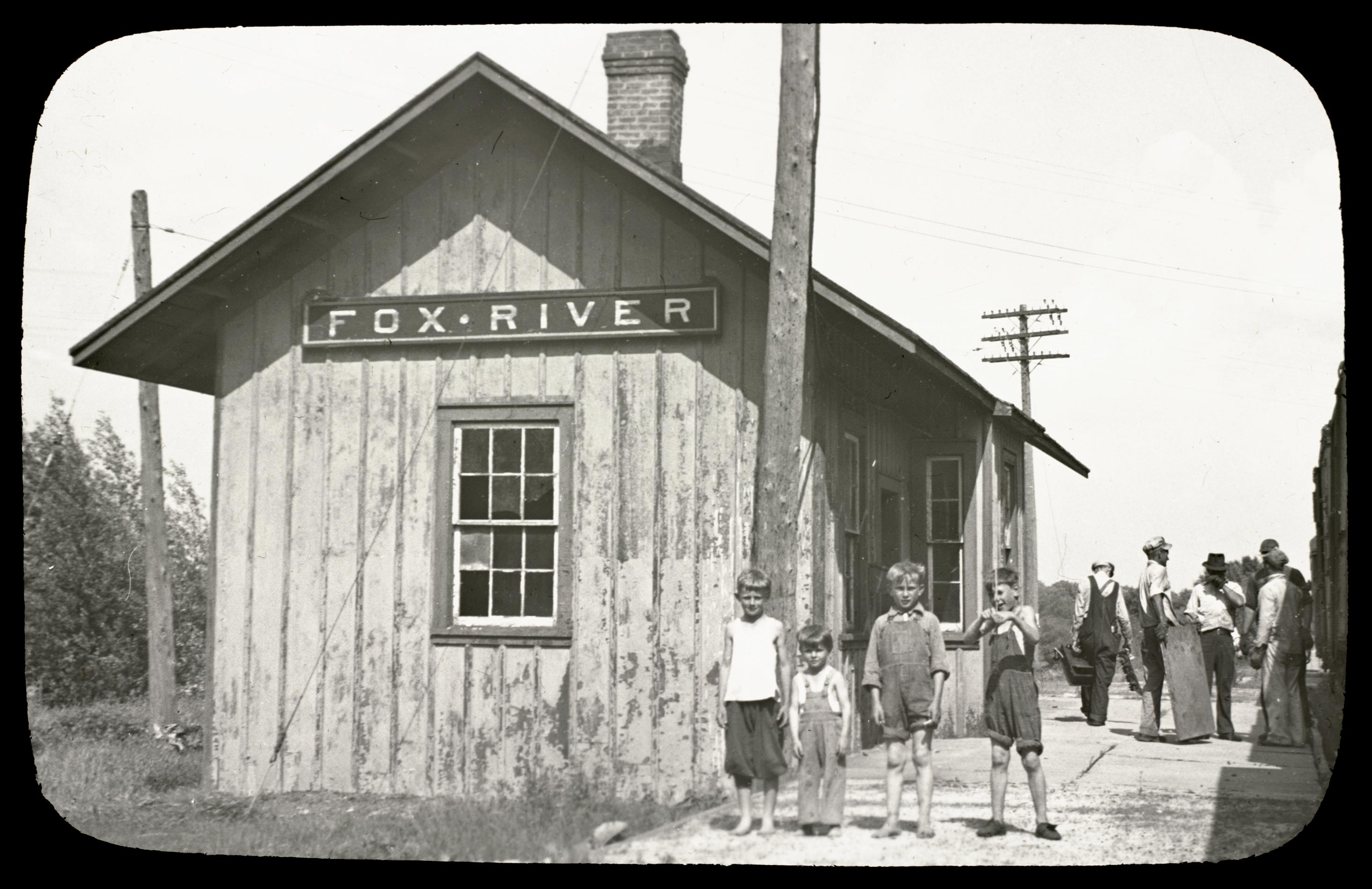 Fox River station (four boys) - UWDC - UW-Madison Libraries
