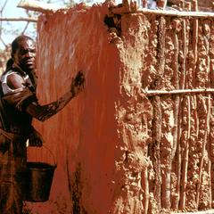 Covering Lattice Work with Red Mud During Construction